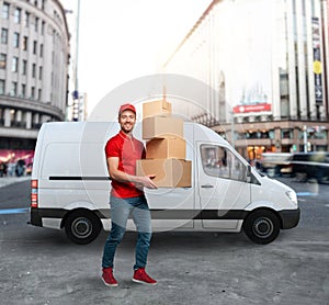 Courier ready to deliver packages with transport truck.