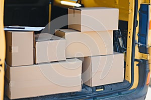 Courier van full of parcels and boxes