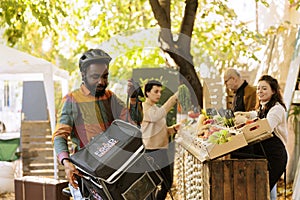 Courier waits for order at local market