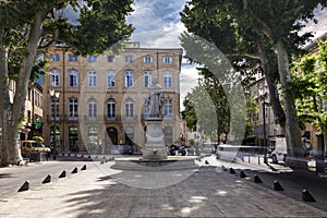 Cours Mirabeau with the statue of King Rene in Aix en Provence photo