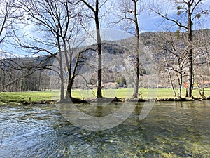 The course of the river Orbe between the cave or spring and the settlement of Vallorbe der Fluss Orbe or le fleuve de l`Orbe