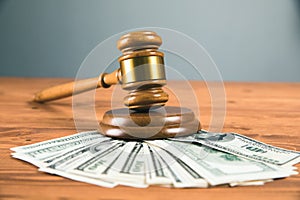 Court gavel with money on the table