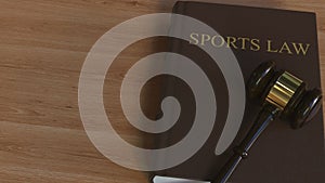 Court gavel on SPORTS LAW book. Conceptual 3D rendering