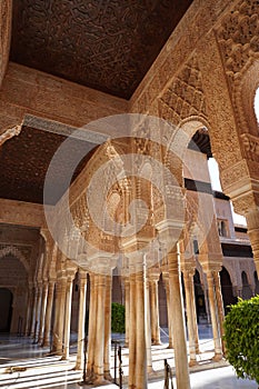 The Court of Lions line Hall architecture of Alhambra Palace building from Granada City. Spain.