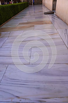 The Court of Lions line hall marble floor from Alhambra Palace building in Granada City. . Spain. Spain.