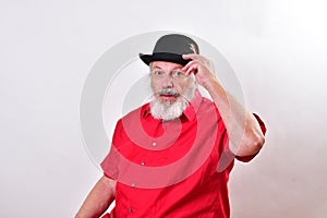 A courteous gentleman tipping his hat photo