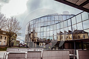 Courthouse of Arlon, Province of Luxembourg, Belgium. View of the exterior, modern glass architecture. Historic building of the ci