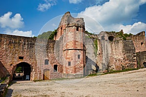 Courtyard of the castle ruins Hardenburg, medival under blue sky