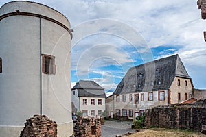 courtyard of the castle veste Otzberg during summer with tower, building facade and wall