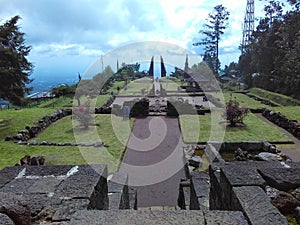 The courtyard of the Cetho temple is visible from a higher ground photo