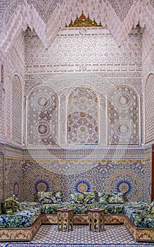 Courtyard decorated with mosaic and carvings in a Moroccan riad