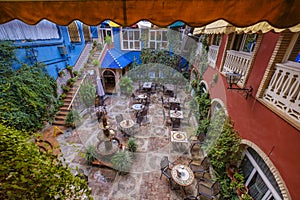 Courtyard garden with terrace full of decoration