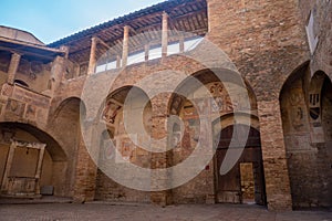 Courtyard of Medieval towers, San Gimignano, Tuscany, Italy