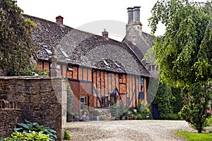 Courtyard in old English manor and barn