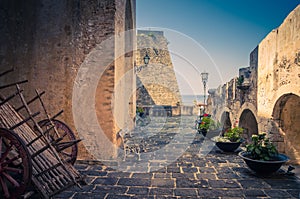 Courtyard old medieval castle Castello Ruffo, Scilla, Italy