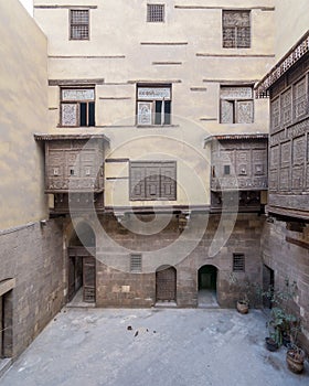Courtyard of ottoman historic house of Zeinab Khatoun with wooden oriel windows photo