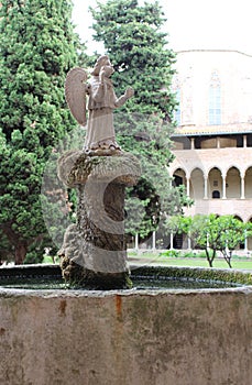 The courtyard of the Pedralbes Monastery in Barcelona in the style of the Catalan Gothic.
