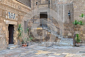 Courtyard of Prince Taz palace with staircase and entrance, Old Cairo, Egypt