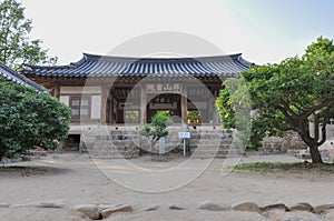 Courtyard with small tree and traditional korean buildings from itâ€™s joseon-era. Byeongsan Seowon, Andong, South Korea