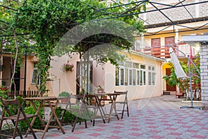 The courtyard space of a small private hotel, a common plan