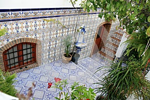 Courtyard with Spanish azulejos, Nijar, Andalusia photo