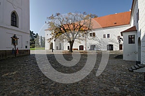 The courtyard of Trebic castle together with The Basilica of St. Procopius, Czech Republic