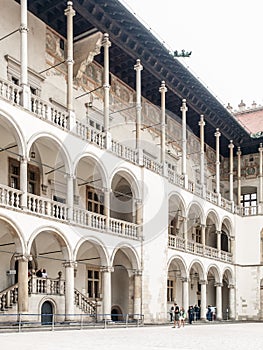 Courtyard with white arcades of Wawel Castle, Krakow, Poland