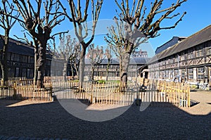 Couryard in Aitre de Saint Maclou in Rouen, ancient graveyard of victims of epidemic. Rouen, Normandy, France