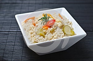 Cous cous, amaranth or birdseed with vegetables