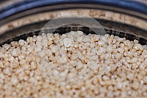 Cous Cous grain texture close-up. Macro picture of grain of cous cous
