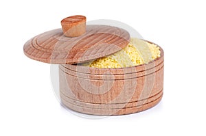 Cous cous in wooden bowl with lid