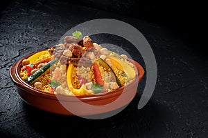 Couscous with meat and vegetables, festive Tunisian food with chickpeas