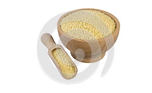 Couscous   in wooden bowl and scoop isolated on white background. nutrition. bio. natural food ingredient photo