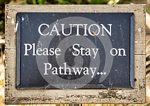 Coution Please Stay on Pathway..