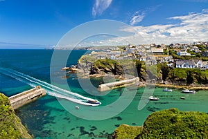 Cove and harbour of Port Isaac with ship, Cornwall photo