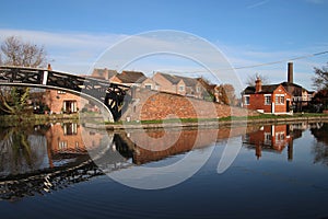 Coventry canal waters oxford canal route reflections of bridge and buildings hawkesbury junction