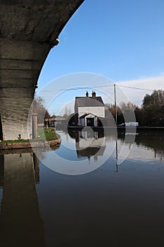 Coventry canal waters oxford canal route reflections of bridge and buildings hawkesbury junction