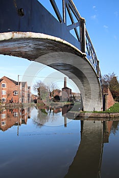 Coventry canal waters oxford canal route reflections of bridge and buildings hawkesbury junction