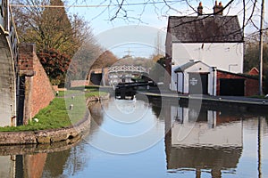 Coventry canal waters oxford canal route reflections of bridge and buildings hawkesbury junction