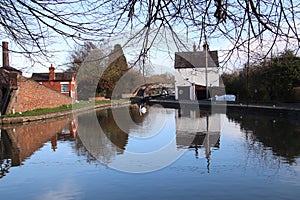 Coventry canal waters oxford canal route reflections of bridge and buildings hawkesbury junction