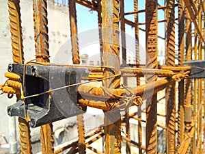 Cover block provided in the reinforcement of shear wall photo