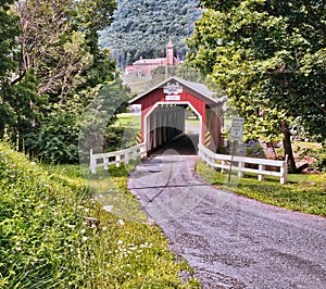 Red Covered Bridge on a peaceful country road.