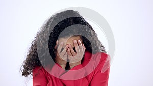 Cover face, shy and embarrassed woman in studio isolated on a white background. Portrait, anxiety and person with fear