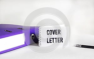 Cover letter text concept on notepad and white background with document folder
