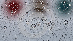 Cover a transparent surface creating a pattern of circular droplets