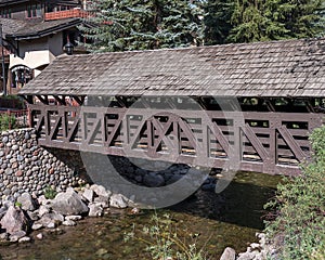 Covered Bridge across Gore Creek in Vail Village, Colorado.