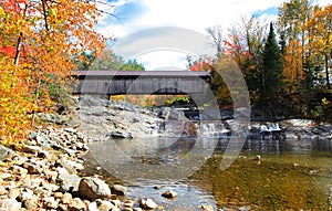 Covered bridge Ammonoosuc river in New Hampshire