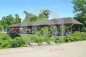 The covered bridge gallery in summer day. Braniewo, Poland