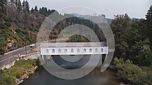 Covered bridge over river near Vida, Oregon