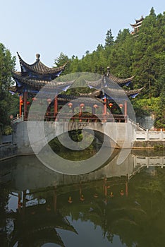 Covered bridge with reflection at enshi, China